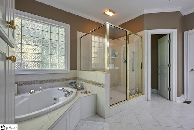 bathroom with ornamental molding, tile flooring, and separate shower and tub