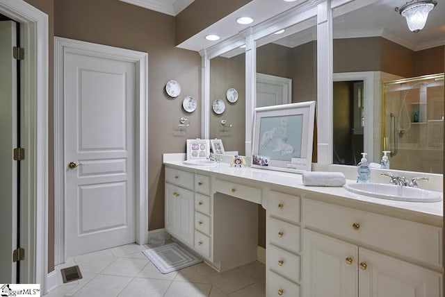 bathroom with crown molding, double sink vanity, tile floors, and walk in shower