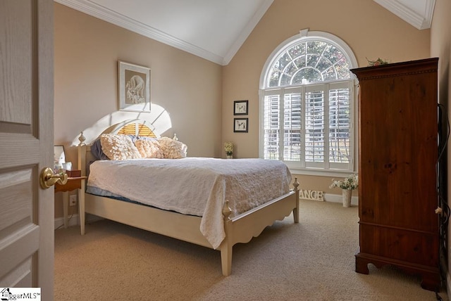 carpeted bedroom with ornamental molding and vaulted ceiling