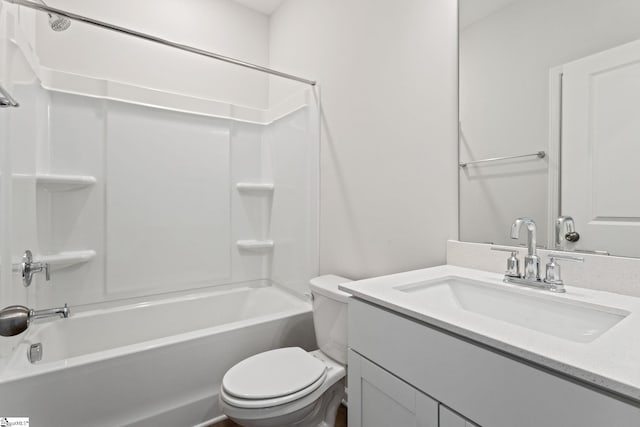 full bathroom with toilet, vanity, and bathtub / shower combination