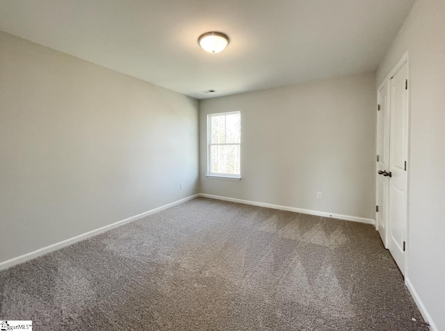 view of carpeted spare room