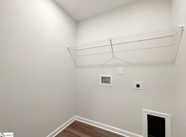 laundry area featuring electric dryer hookup, washer hookup, and hardwood / wood-style floors