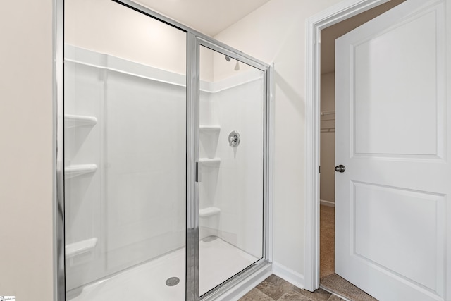 bathroom with an enclosed shower