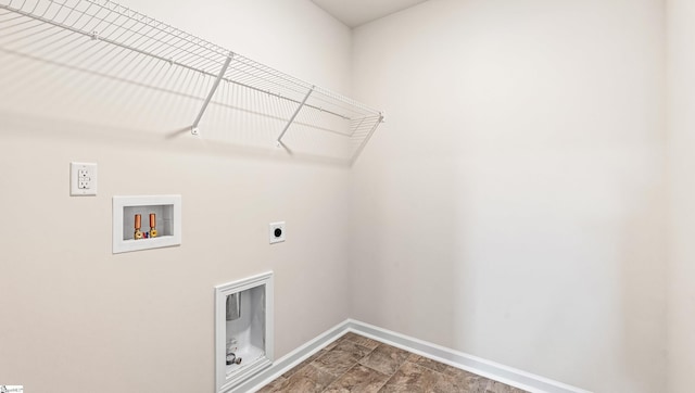 laundry area with hookup for an electric dryer and hookup for a washing machine