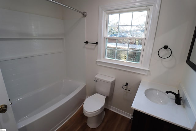 full bathroom featuring vanity, wood-type flooring, shower / washtub combination, and toilet