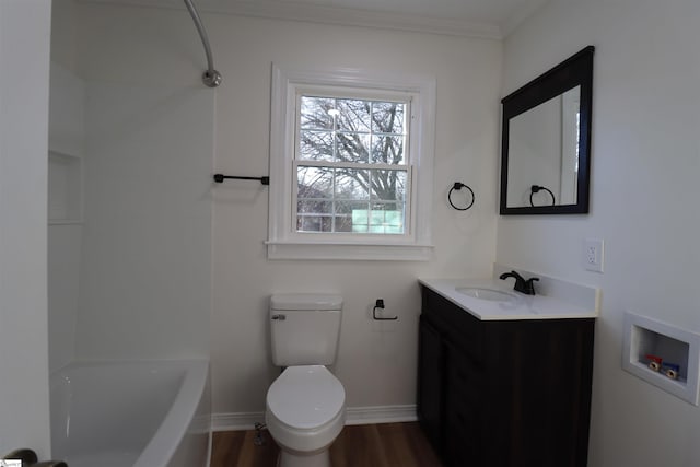 full bathroom featuring shower / bathtub combination, wood-type flooring, vanity, ornamental molding, and toilet