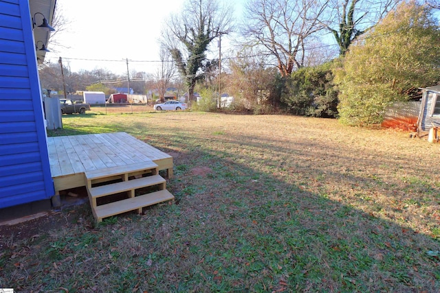 view of yard featuring a deck