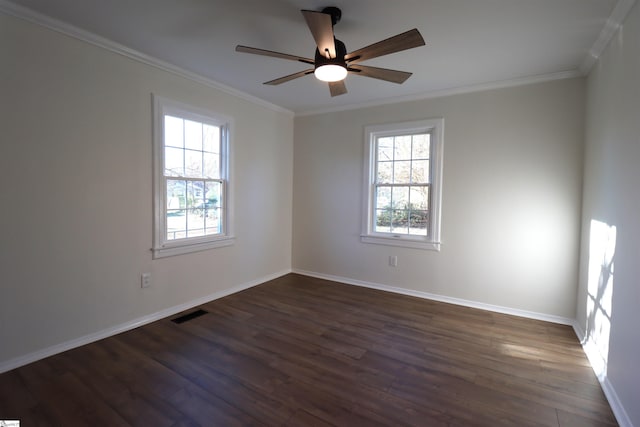 spare room with ceiling fan, ornamental molding, and dark hardwood / wood-style floors