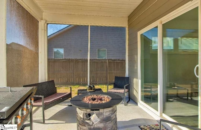 sunroom / solarium featuring wooden ceiling