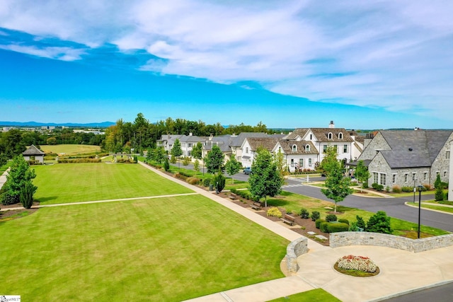 surrounding community featuring a lawn