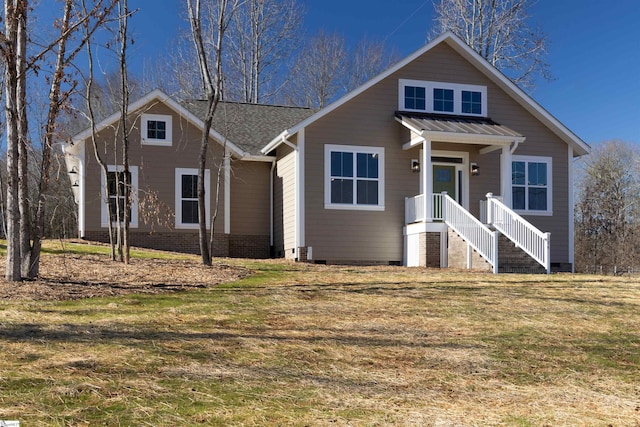 view of front of home featuring a front yard