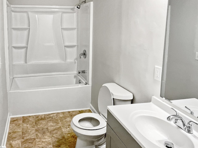 full bathroom featuring toilet, tub / shower combination, and vanity