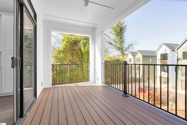 exterior space with a wealth of natural light and ceiling fan