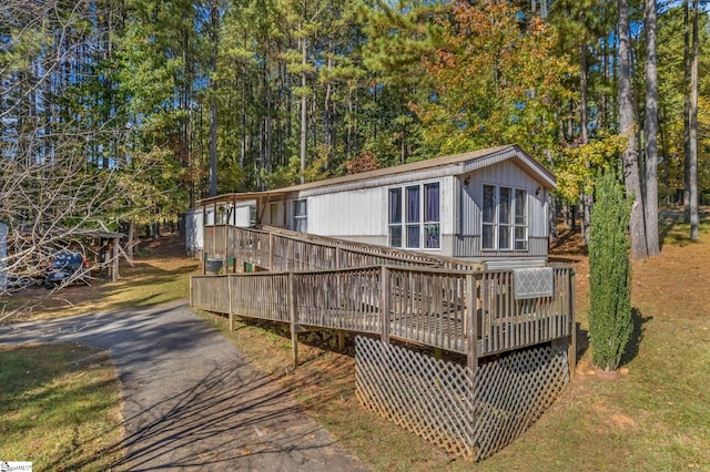 rear view of property with a deck