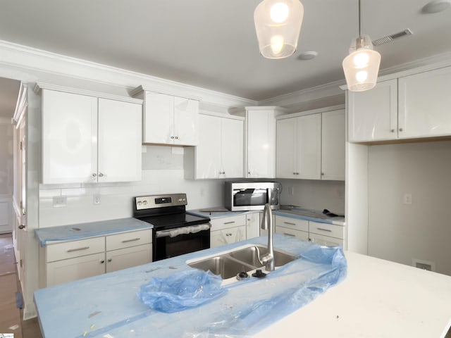 kitchen featuring white cabinetry, sink, pendant lighting, a kitchen island with sink, and appliances with stainless steel finishes