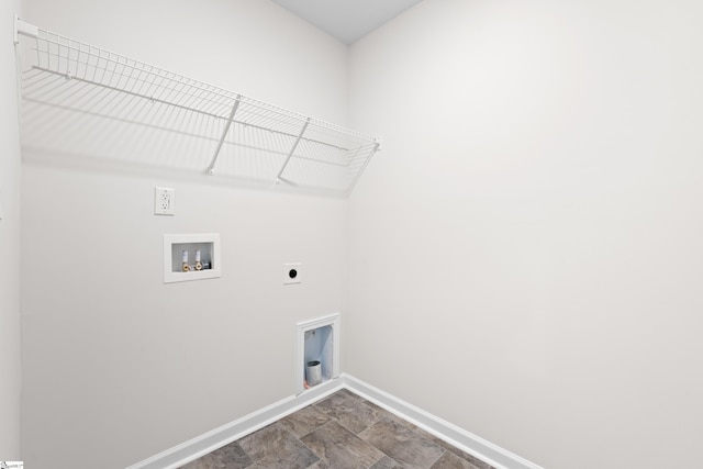 clothes washing area with baseboards, laundry area, washer hookup, and hookup for an electric dryer