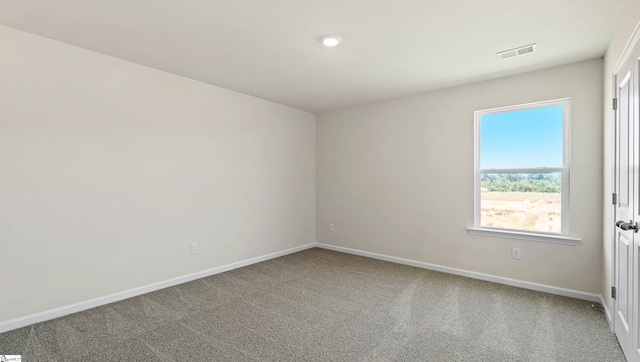 unfurnished room with carpet