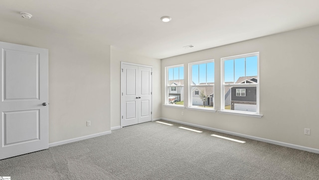 view of carpeted spare room