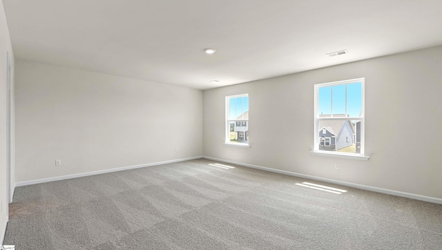 view of carpeted spare room