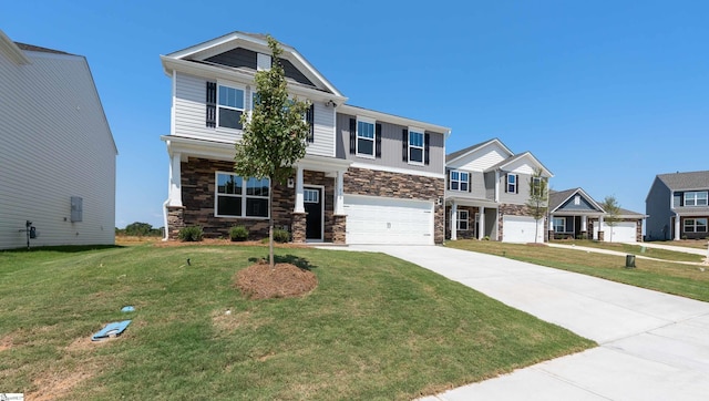 view of front of house with a front lawn and a garage