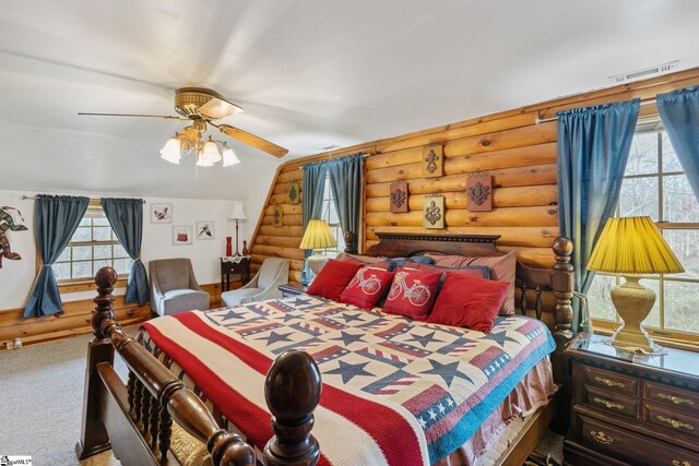 728 Tall Oak Trl, Seneca, SC 29678 - bedroom with carpet floors, log walls, and ceiling fan
