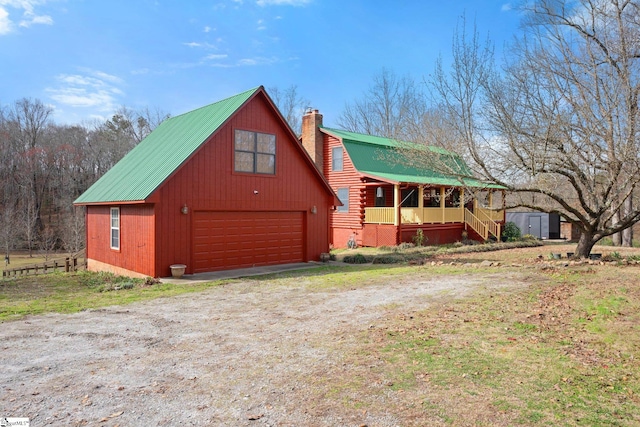 log-style house with a porch