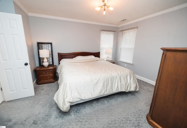 carpeted bedroom with an inviting chandelier and ornamental molding