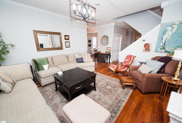 living room with an inviting chandelier, dark hardwood / wood-style flooring, and ornamental molding