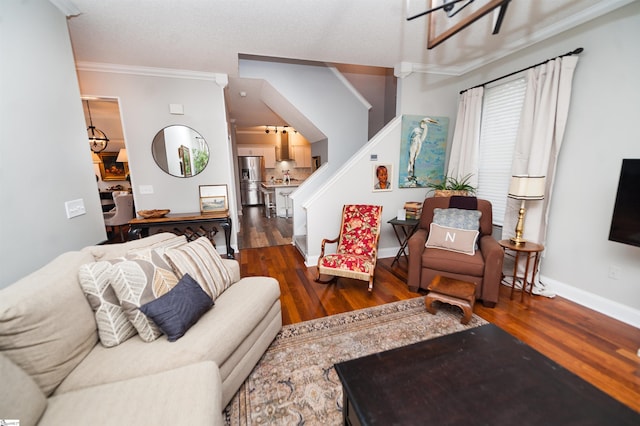 living room featuring dark hardwood / wood-style floors and ornamental molding