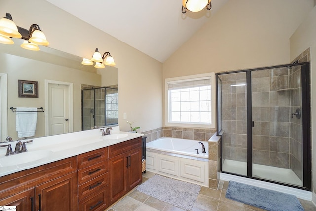 bathroom featuring tile floors, double sink, a chandelier, vanity with extensive cabinet space, and plus walk in shower