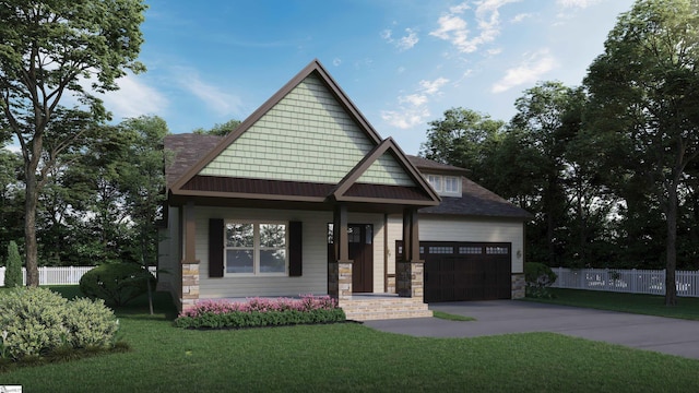 craftsman house with covered porch, a garage, and a front lawn