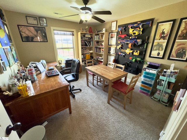 office area with carpet and ceiling fan