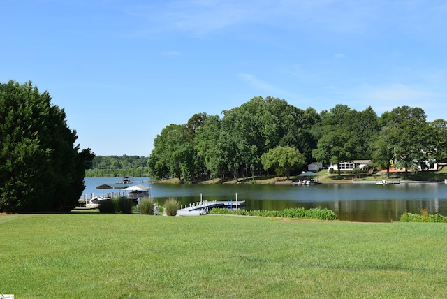 property view of water featuring a boat dock