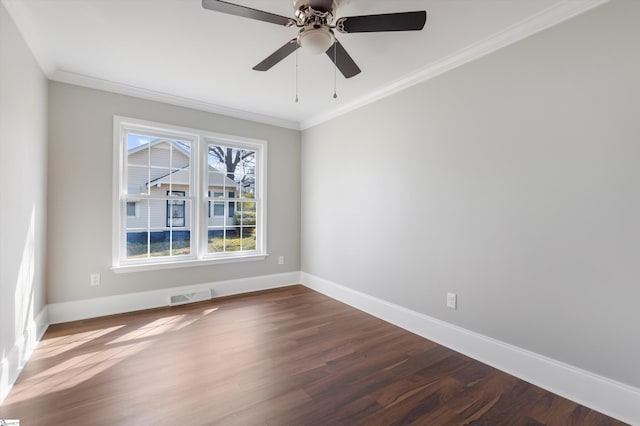 unfurnished room featuring dark wood-type flooring, ornamental molding, and ceiling fan