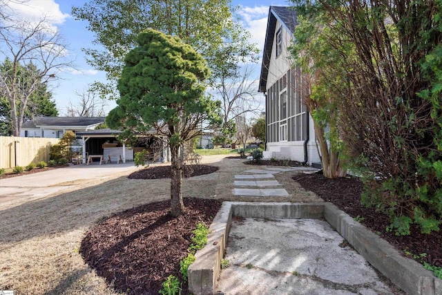 view of yard featuring a carport