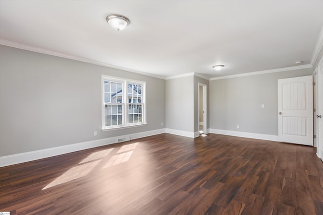 spare room with crown molding and dark wood-type flooring