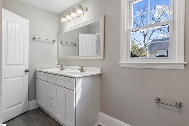 bathroom featuring vanity and tile flooring