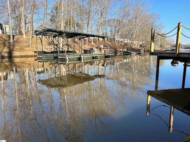 view of dock with a water view