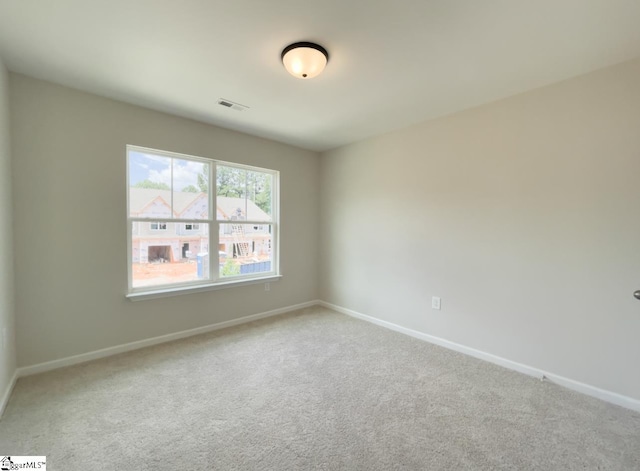 empty room with carpet floors