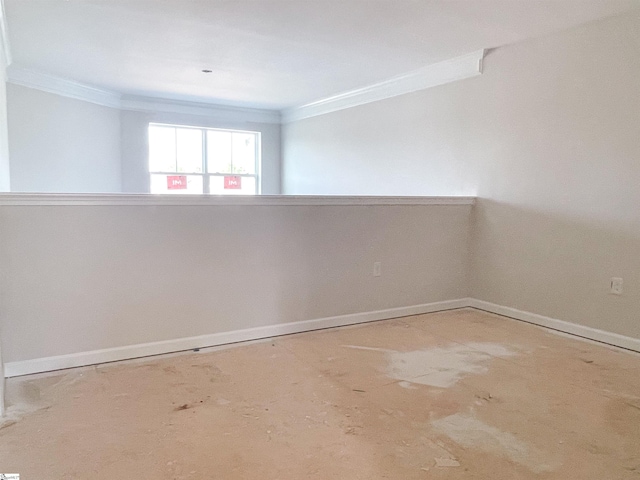 unfurnished room featuring ornamental molding