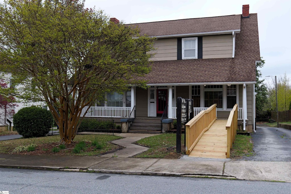 view of front of home featuring covered porch