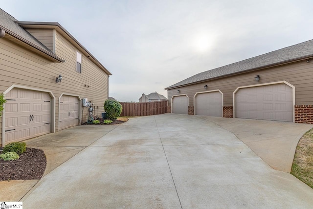 view of property exterior featuring a garage