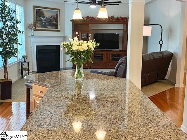 dining room with ceiling fan, light hardwood / wood-style flooring, and a wealth of natural light