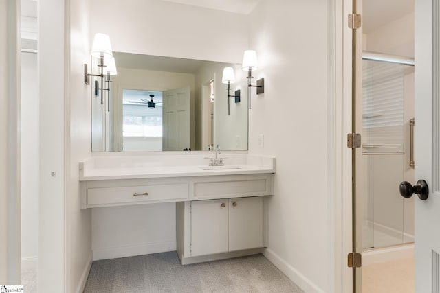 bathroom featuring vanity and walk in shower