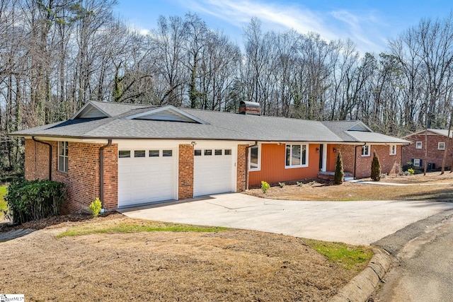 ranch-style house featuring a garage