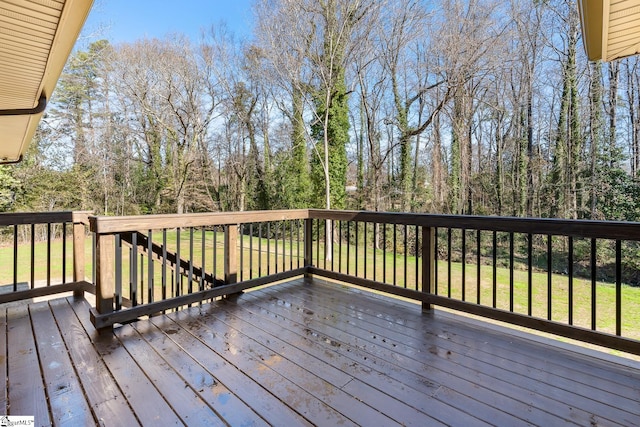 deck featuring a yard