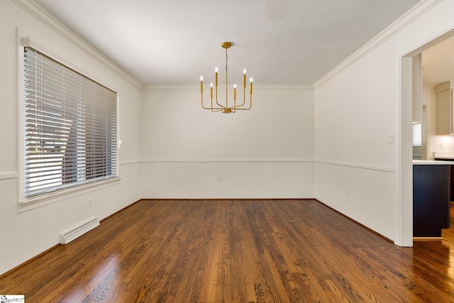 unfurnished room featuring dark hardwood / wood-style flooring, a notable chandelier, baseboard heating, and crown molding