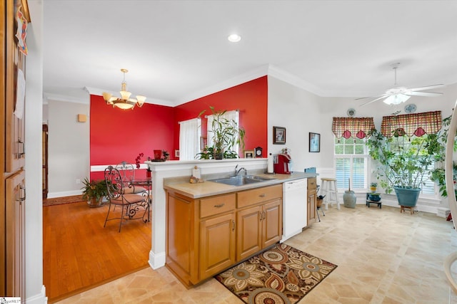 kitchen featuring hanging light fixtures, ceiling fan with notable chandelier, light hardwood / wood-style flooring, dishwasher, and crown molding