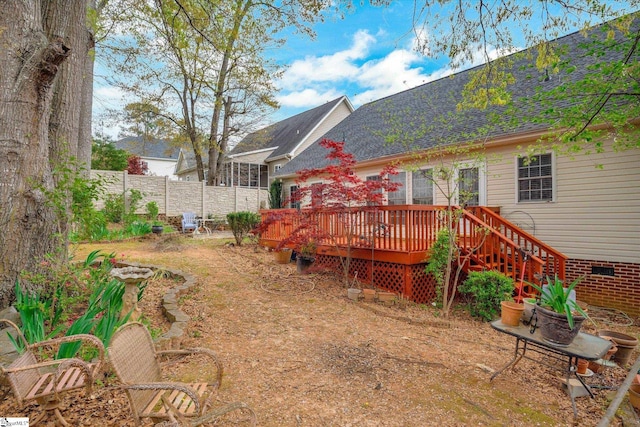 view of yard featuring a deck