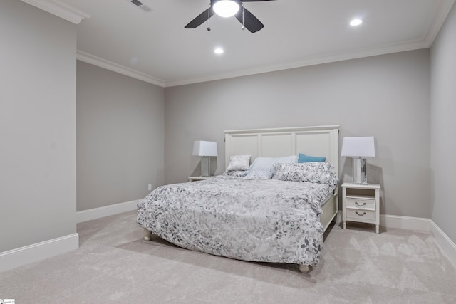 bedroom with ceiling fan, ornamental molding, and light colored carpet